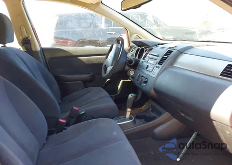 2009 Nissan Versa 1.8S z USA, uszkodzony, nr VIN 3N1BC13E99L374851